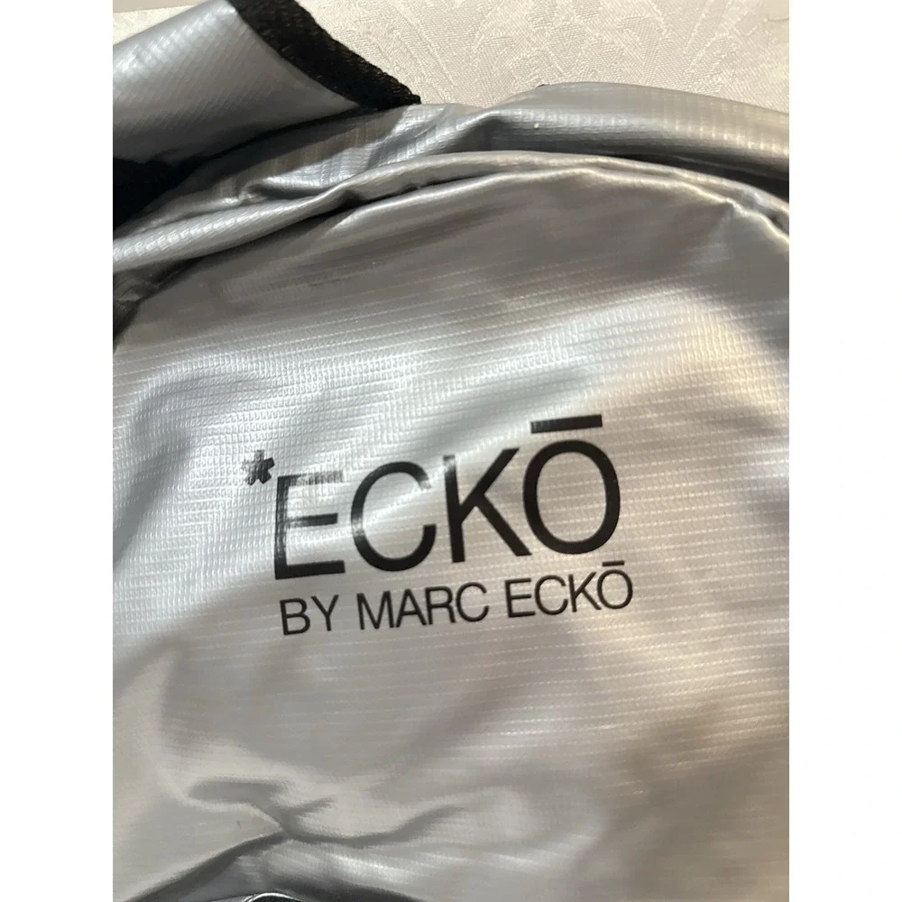 Ecko by Marc Ecko silver metallic backpack iconic black rhino logo front pocket